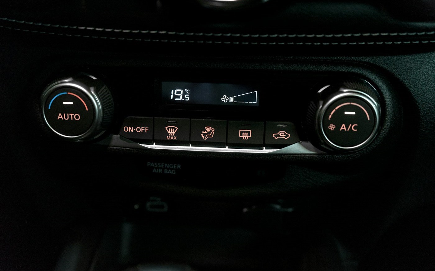 Car air conditioning vents on a dashboard